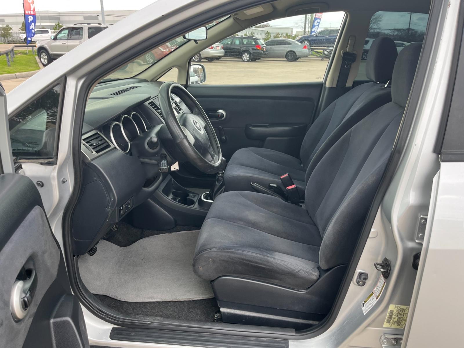 2009 SILVER /black Nissan Versa 1.8 S Hatchback (3N1BC13E09L) with an 1.8L L4 DOHC 16V engine, Manual transmission, located at 14700 Tomball Parkway 249, Houston, TX, 77086, (281) 444-2200, 29.928619, -95.504074 - Photo #8
